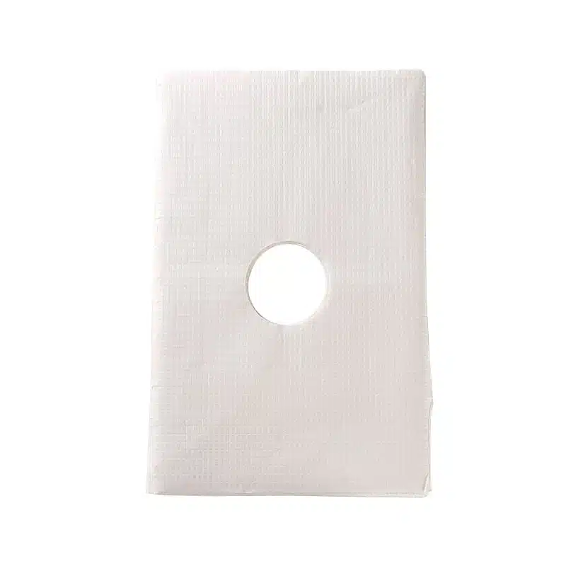 Disposable polycoated paper headrest cover